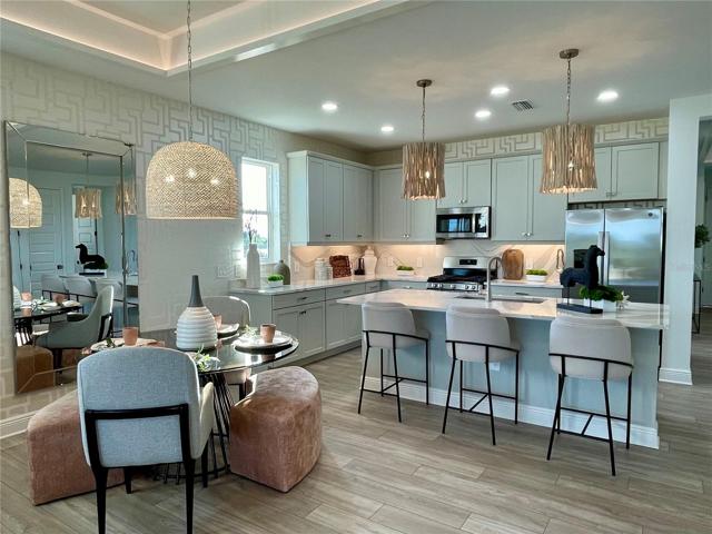 Kitchen Opens to Great Room and Dining