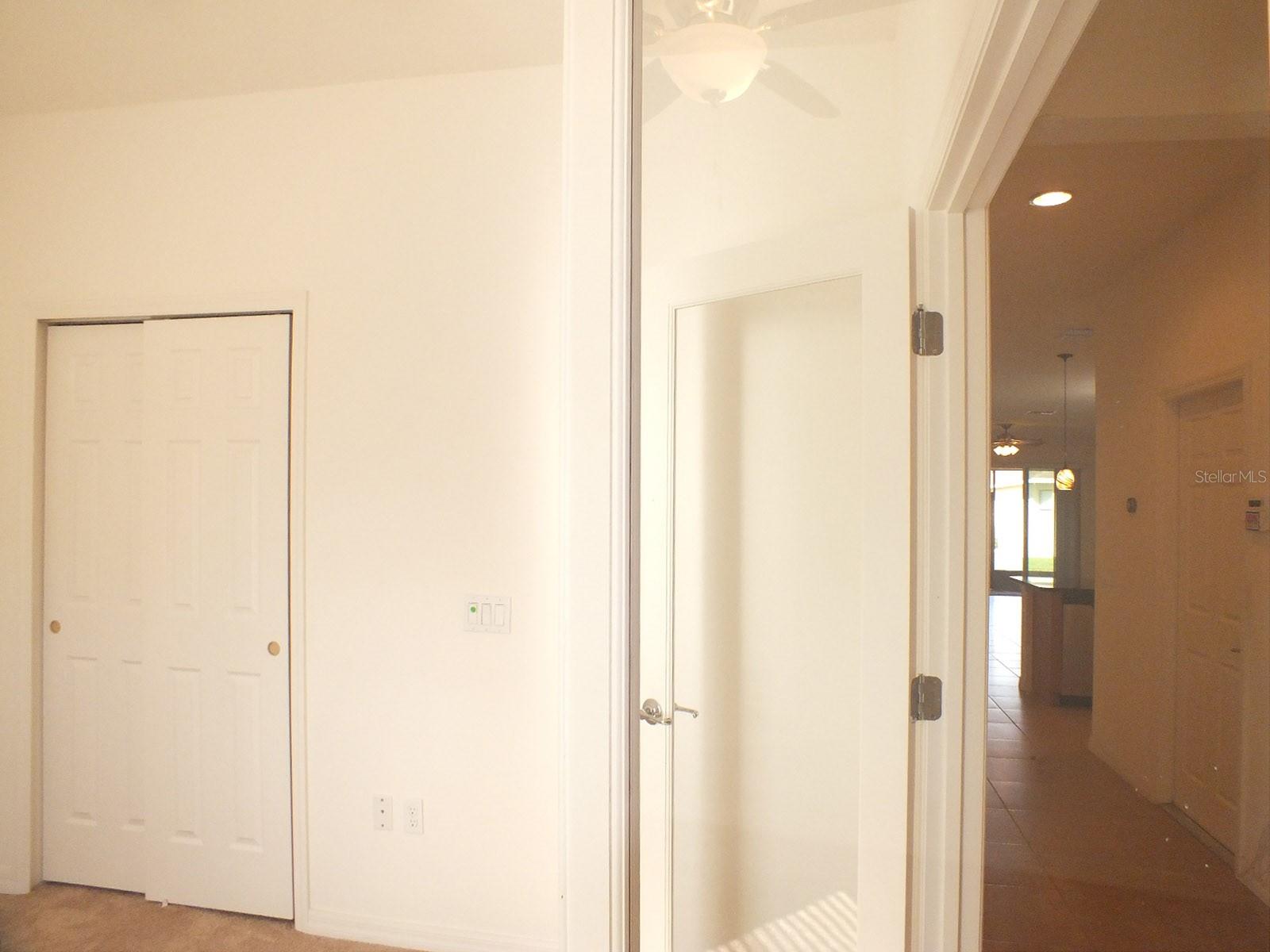 Closet in Study and view down hallway