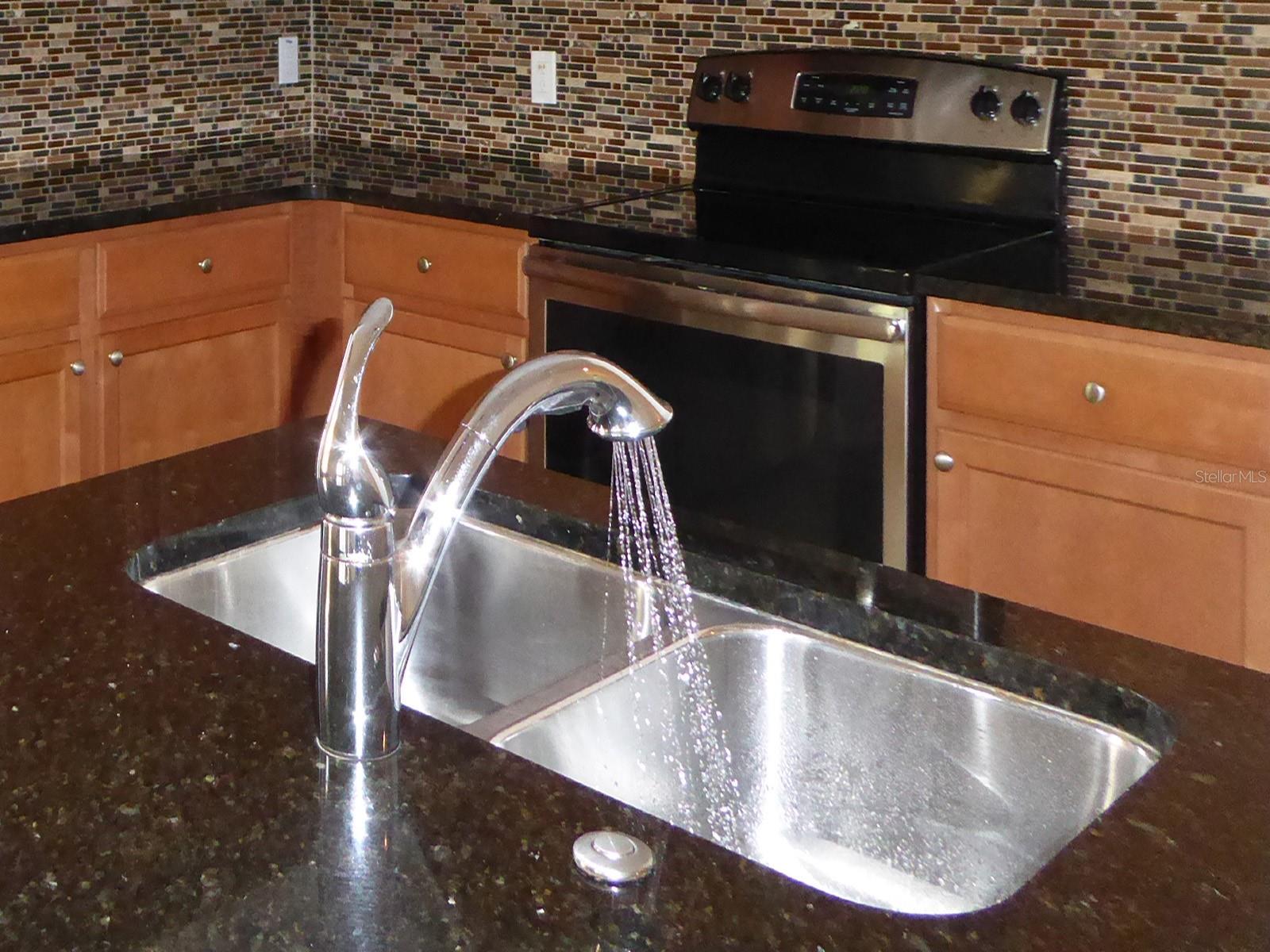 Double stainless steel sink in kitchen island