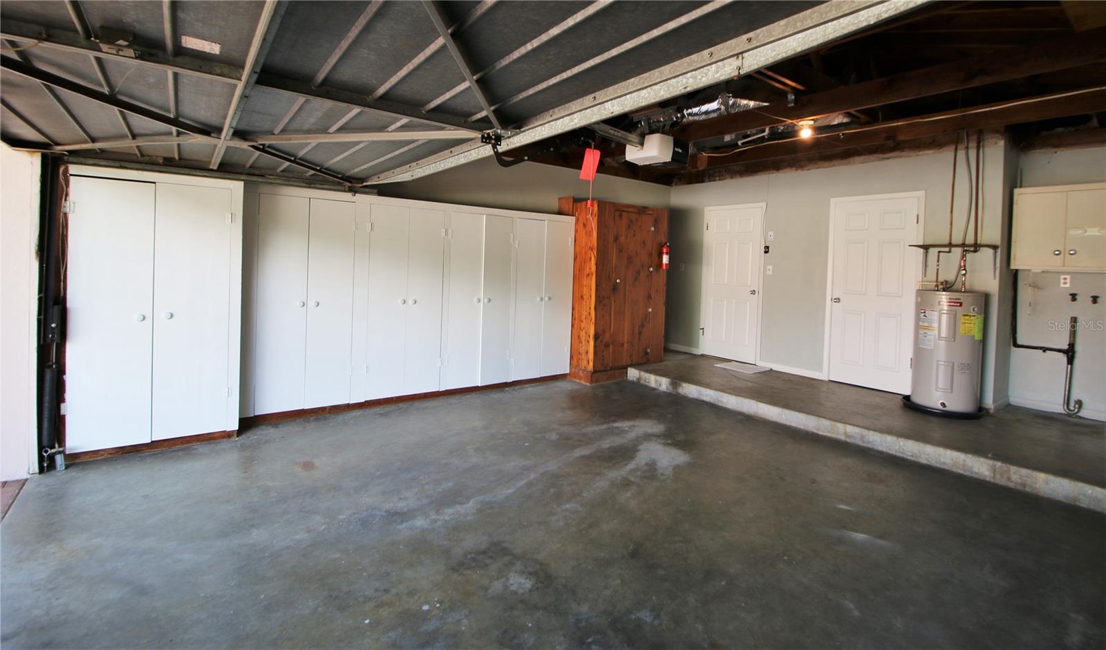 Garage has lots of storage cabinets