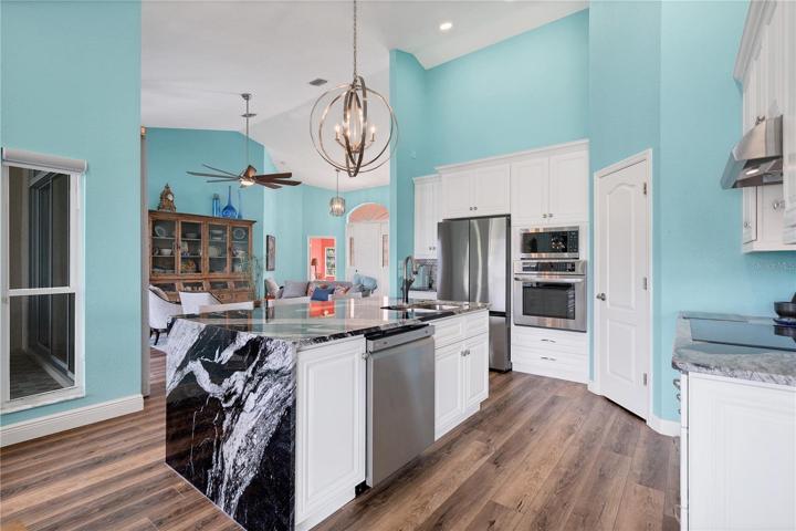 Stainless Steel  Appliances, Solid Wood Cabinetry
