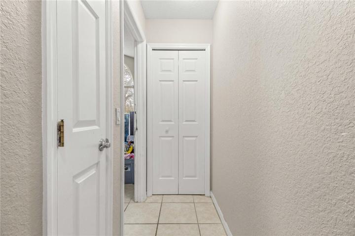 corridor leading to front bedroom/home office
