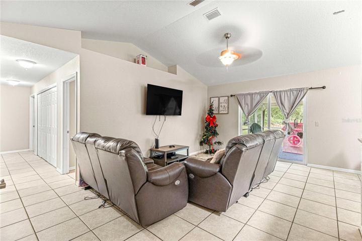 Living room with vaulted ceiling