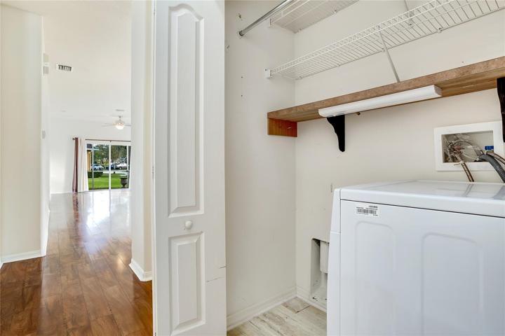 All in one washer/dryer unit in laundry closet