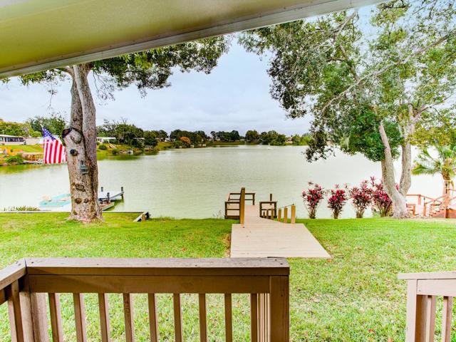 Lake and wooden deck.