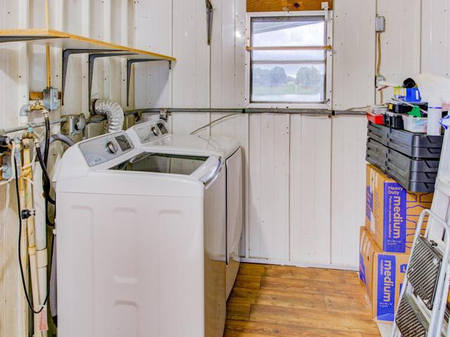 Outside enclosed laundry and storage.