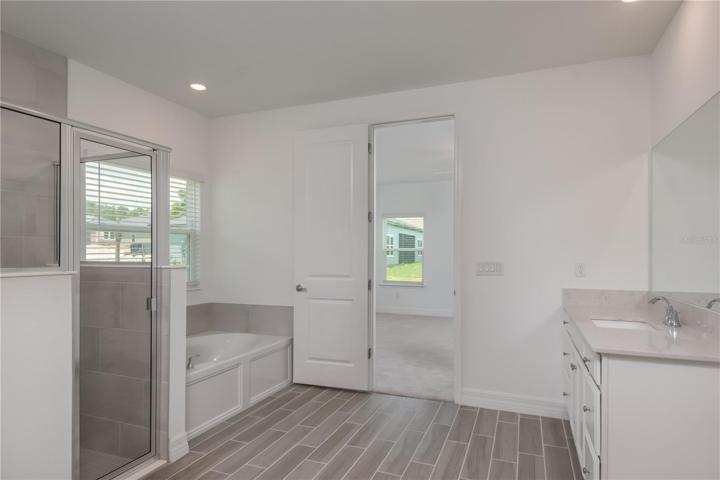 Walk-in Closet in Primary Bedroom/Bathroom