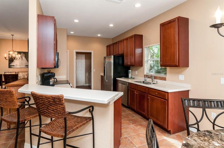 The kitchen has oak cabinets with 42