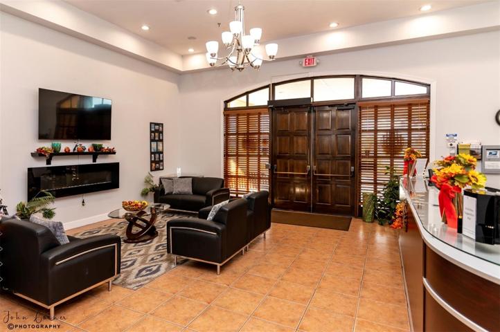 The entry foyer of the Health and Fitness Center holds the activities desk.