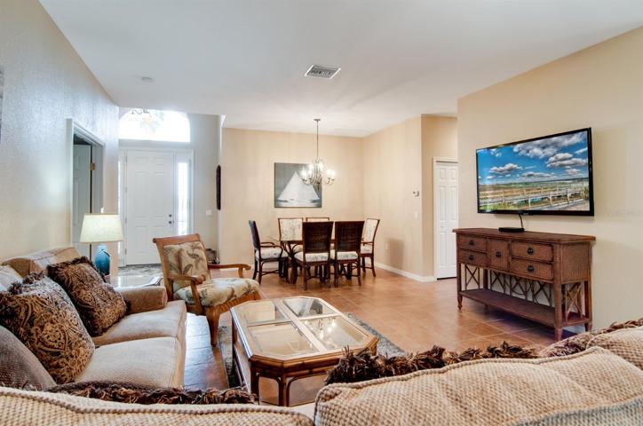 The living room and dining room has ceramic tile flooring.