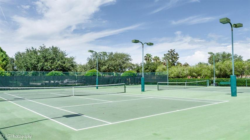 Two lighted tennis courts are on the main clubhouse grounds.