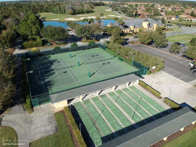 The lighted tennis courts, lighted shuffleboard courts and oudoor basketball courts are on the main clubhouse grounds.