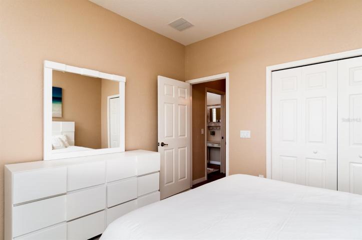 The 2nd bedroom has a reach in closet and is adjacent to the guest bath.