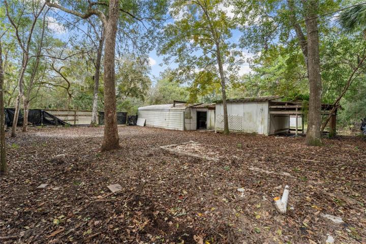 REAR VIEW OF WORKSHOP/GARAGE AND STORAGE BLDG