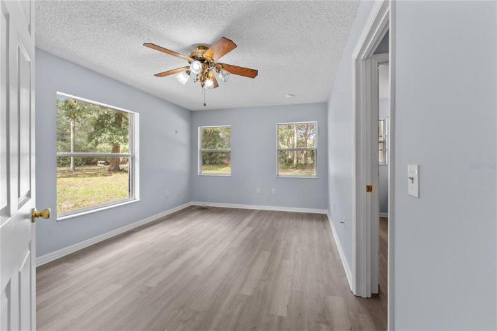 BEDROOM OR COULD BE FAMILY RM/OFFICE/PLAY OR HOBBIE RM