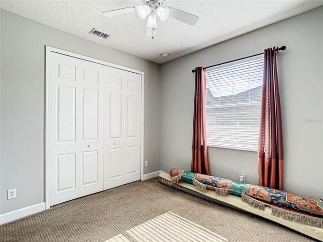 Bedroom 4 overlooks side yard