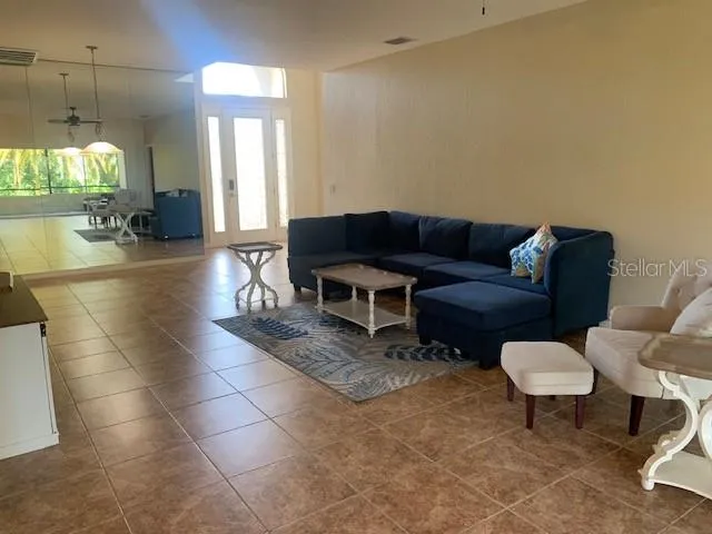 Living room area next to the dining/ or reading area
