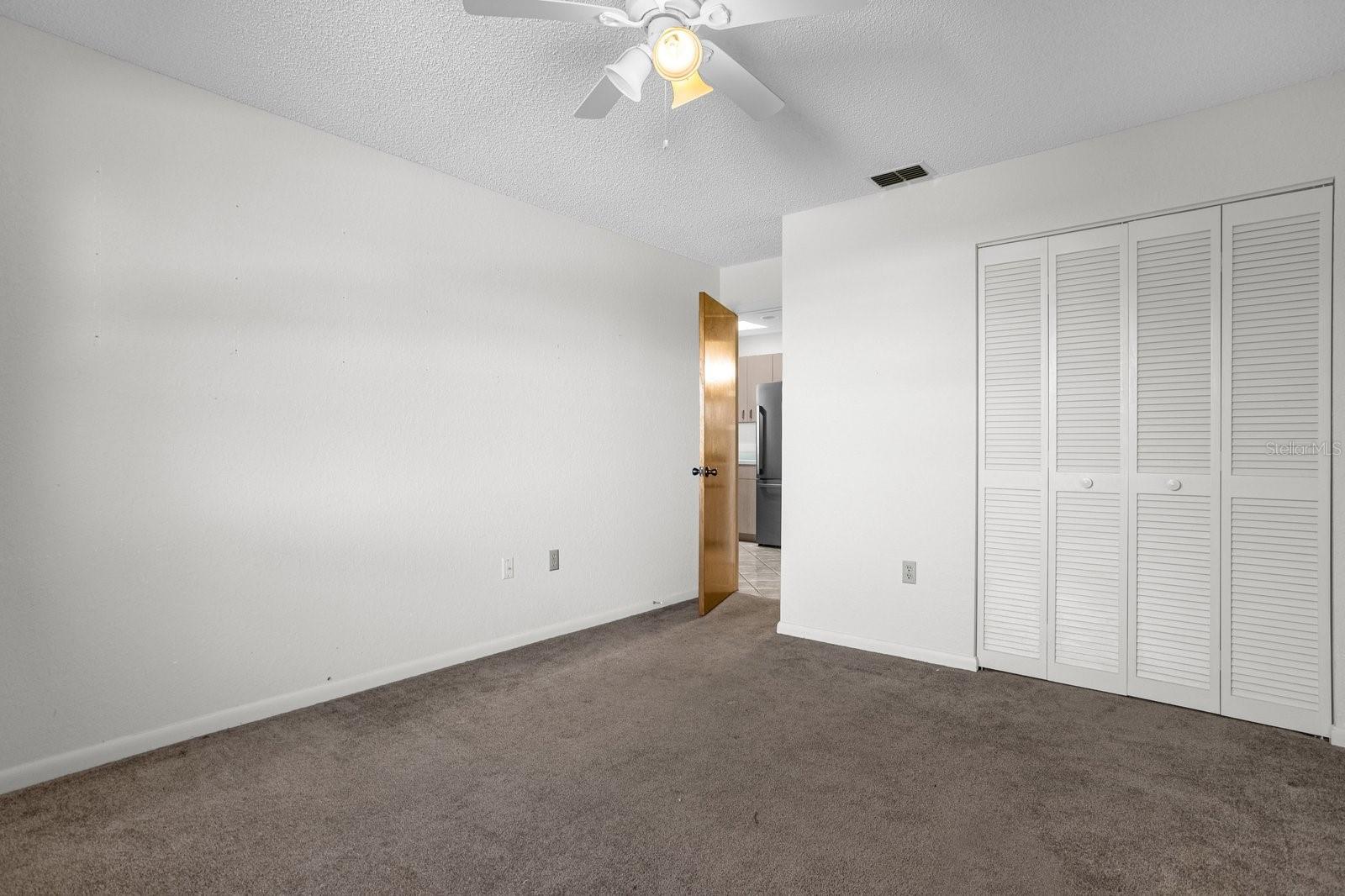 Bedroom 2 with Window and Ceiling Fan