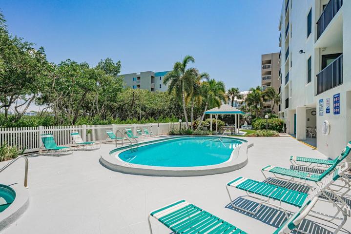 Heated Pool area with seating area