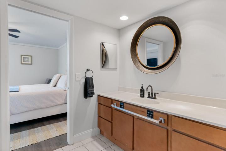 Primary en suite bathroom with large vanity