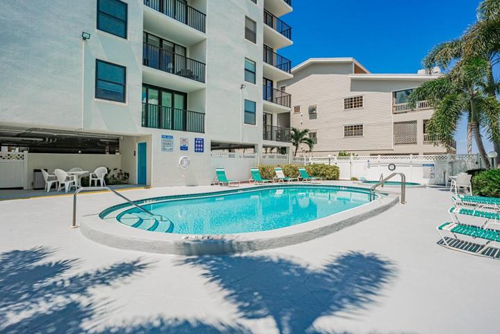 Pool area with seating area