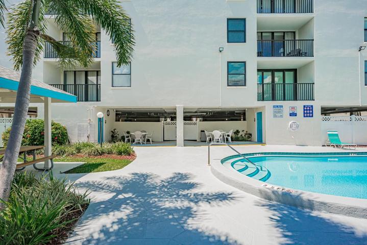 Pool area with seating area