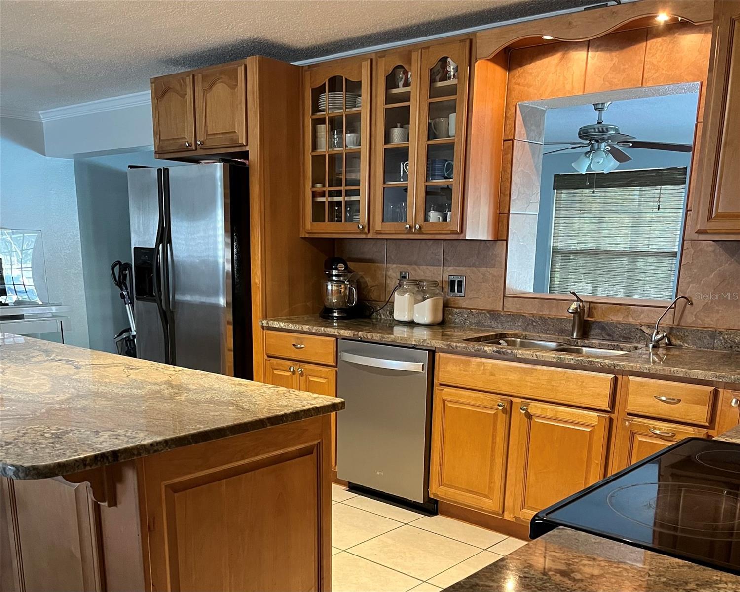 Large Island and ample storage granite counter tops