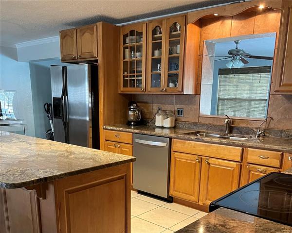 Large Island and ample storage granite counter tops