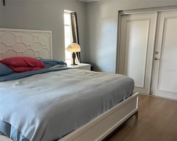 Main bedroom with walk in closet, ensuite bath and built-in storage