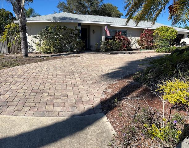 Paver circular driveway and parking pad