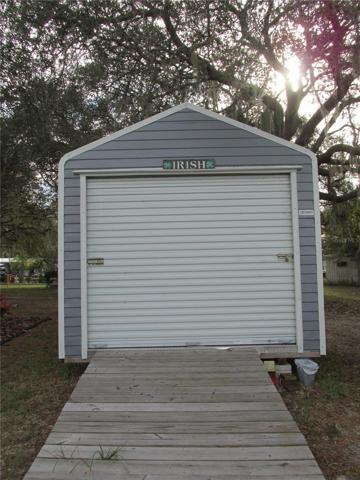 This nifty new 10x10 shed with roll-up door and ramp is the perfect place to store a golf cart.