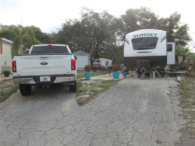 Asphalt parking pad can accommodate the longest RV available!