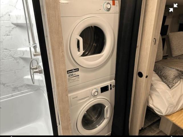 No more going to the laundromat when you buy this 5th wheel!