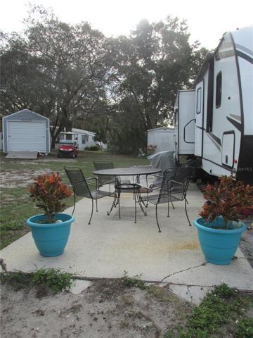 The concrete patio is perfect for chillin' and grillin!