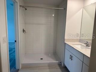 Step in Primary shower with duall sinks and full size mirror.