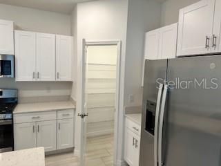 Walk-in pantry in the kitchen.