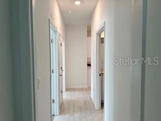 Hallway for three secondary bedrooms.