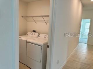 Laundry room located just off the kitchen.