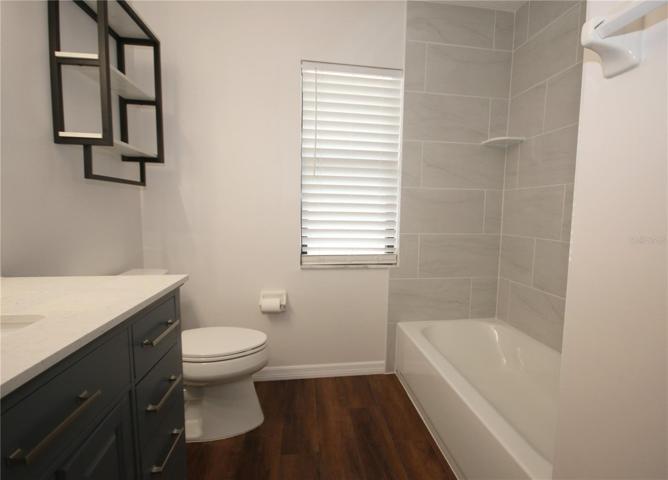 Guest bathroom with tub/shower combo
