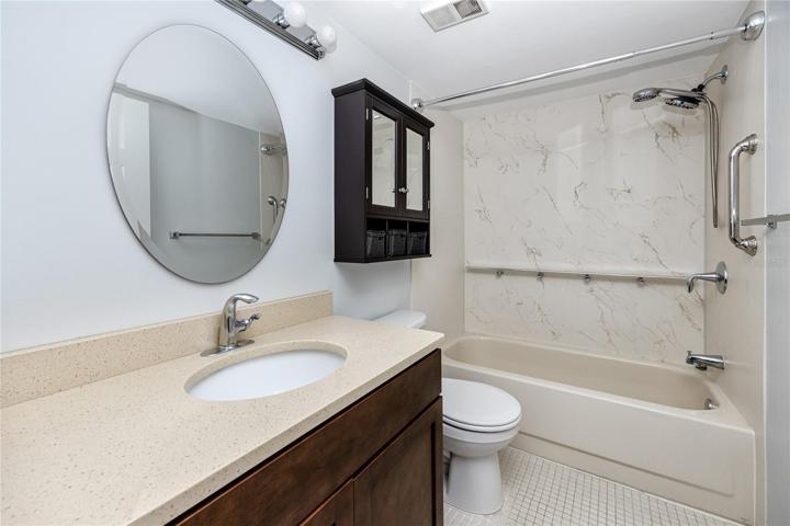 2nd bathroom with newer vantiy and mirror