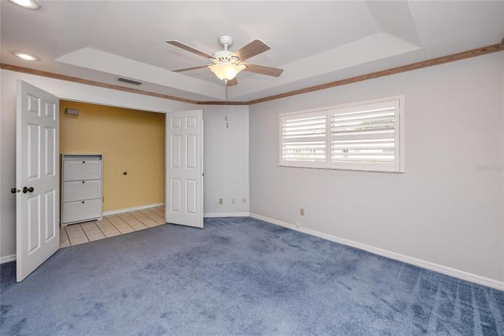 double doors from 3rd bedroom that lead to the foyer