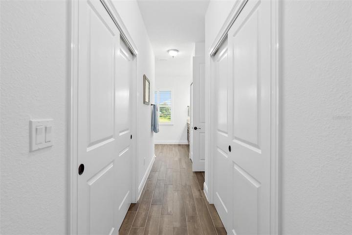 Hallway to Master Bath & Closets