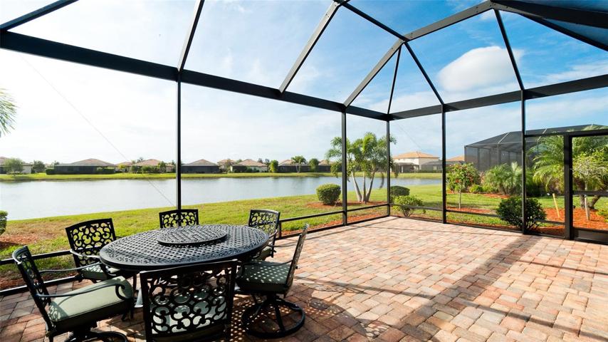 Back of Lanai with Water View and Patio Set