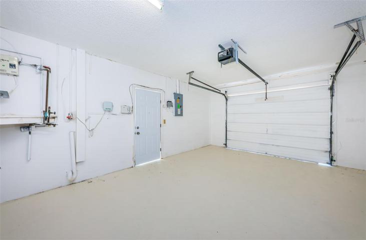 Garage, Tankless hot water heater Approx. 2 years old, Garage door opener 2023