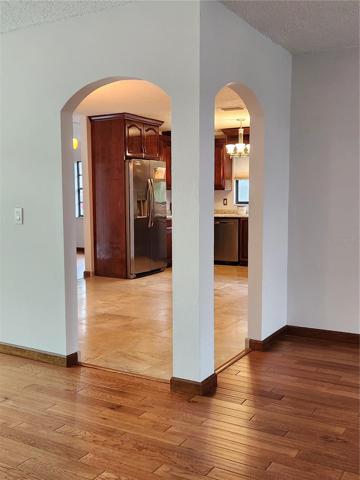View from living room to breakfast nook and kitchen
