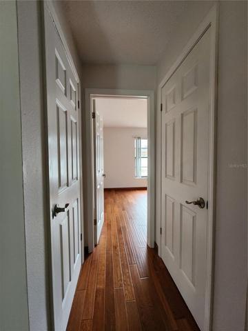 Hallway view of second bedroom