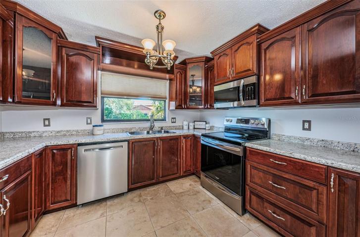 kitchen, view to right side of home