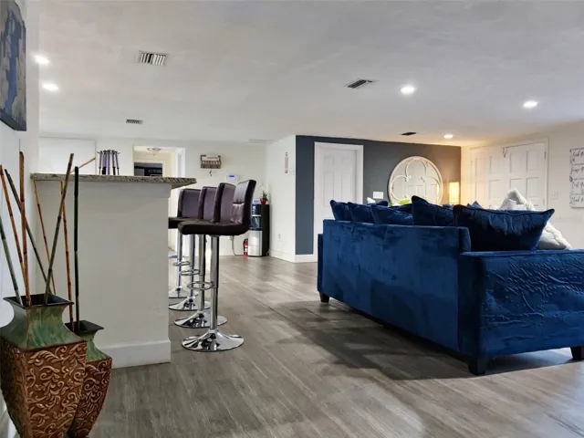 LOOKING AT LIVING ROOM AND BAR TOP FROM MASTER BEDRROM SIDE