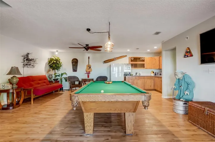 Basement gaming/living area with lake view