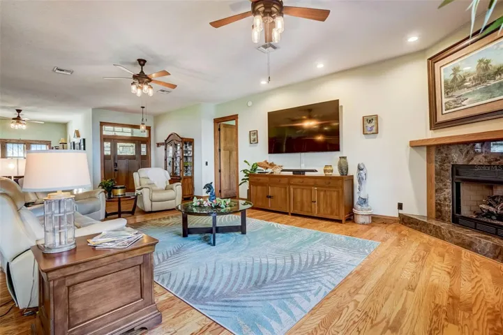 Living room with fire place and view of the lake